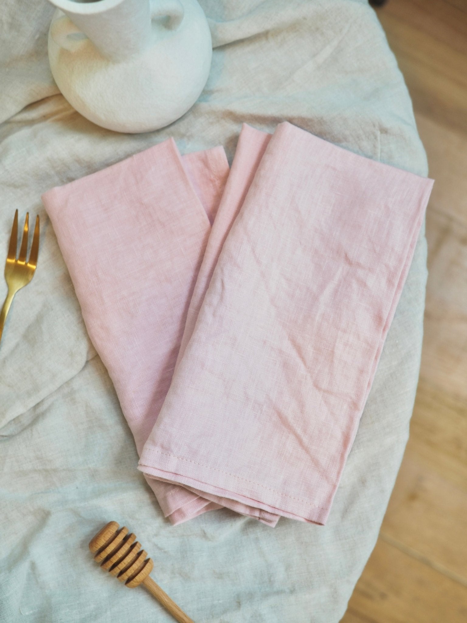 Pure French Linen Napkin in Blush Pink - TSL, placed on a dining table with linen table cloth 